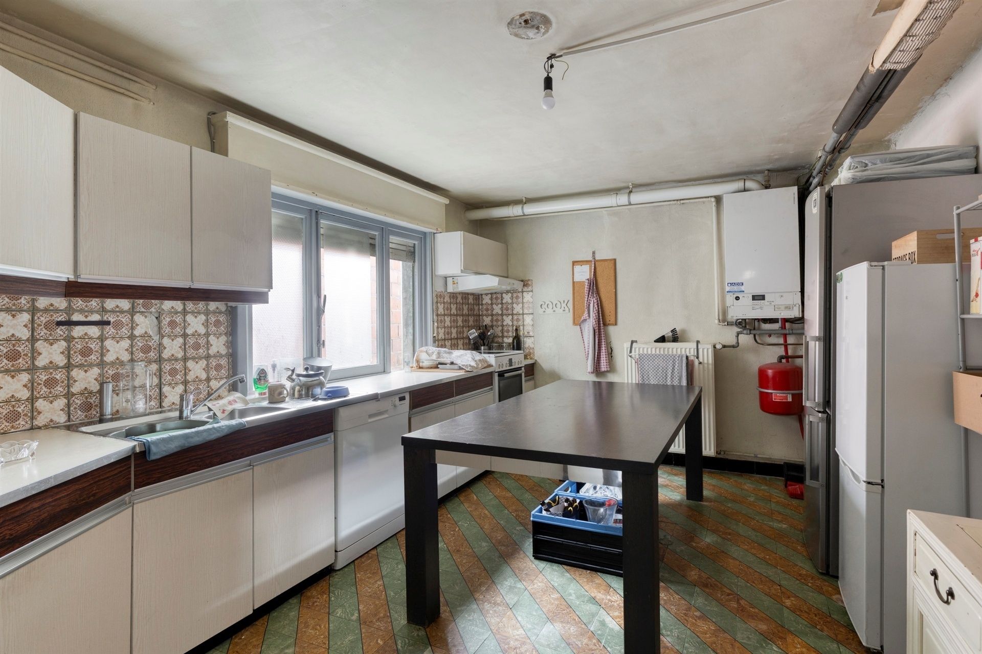 Ruime woning met potentieel in hartje Merchtem
 foto 6