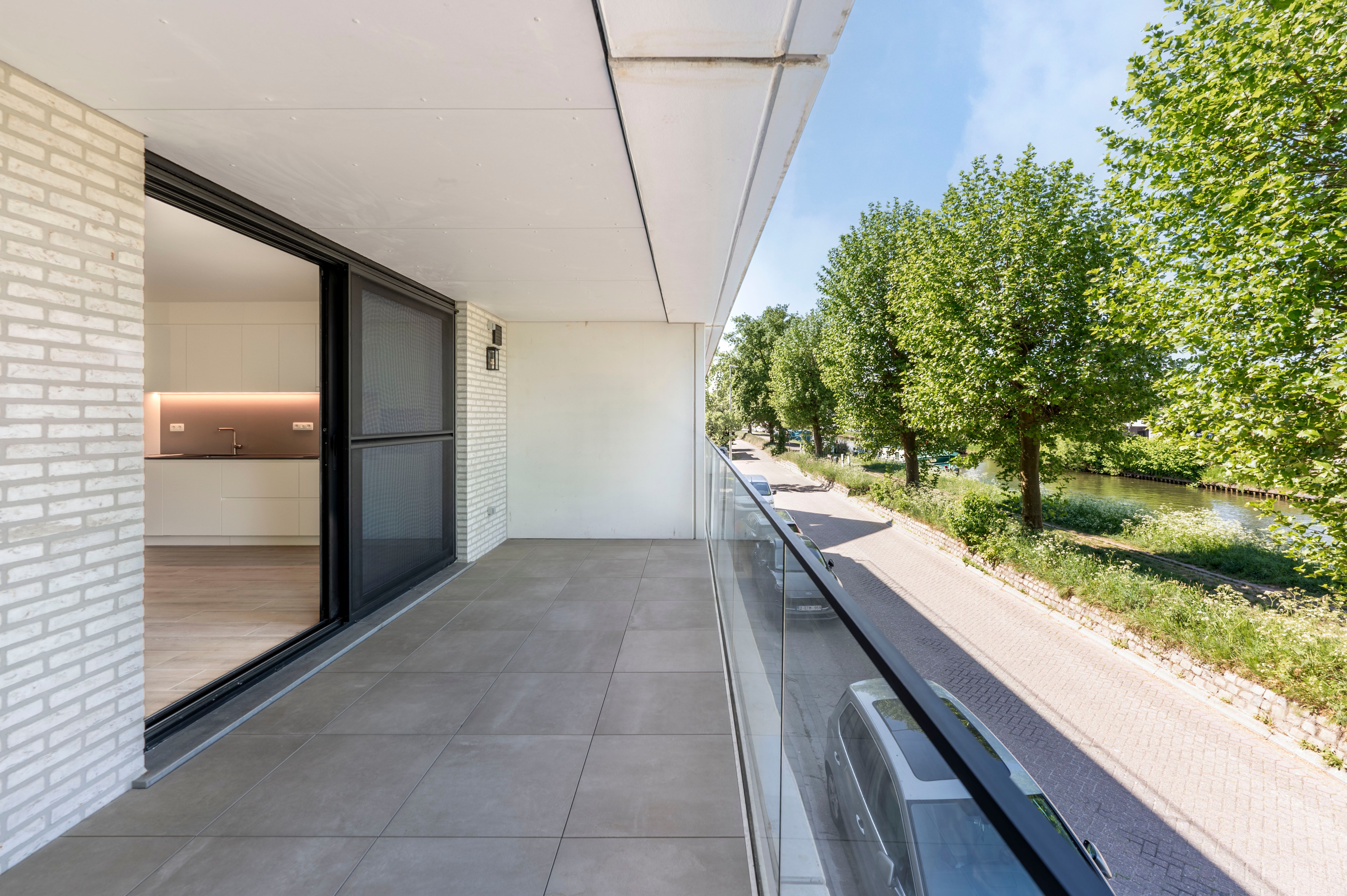 Stijlvol nieuwbouwappartement met uniek zicht op de Vaart van Schoten. foto 10