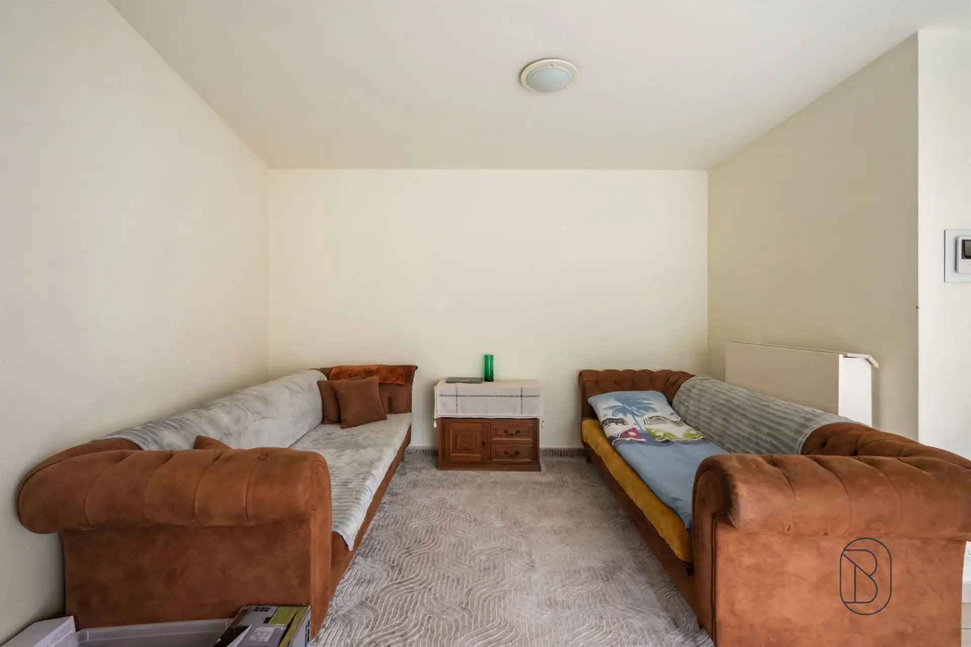 Centraal gelegen duplex appartement met 2SLPK foto 3