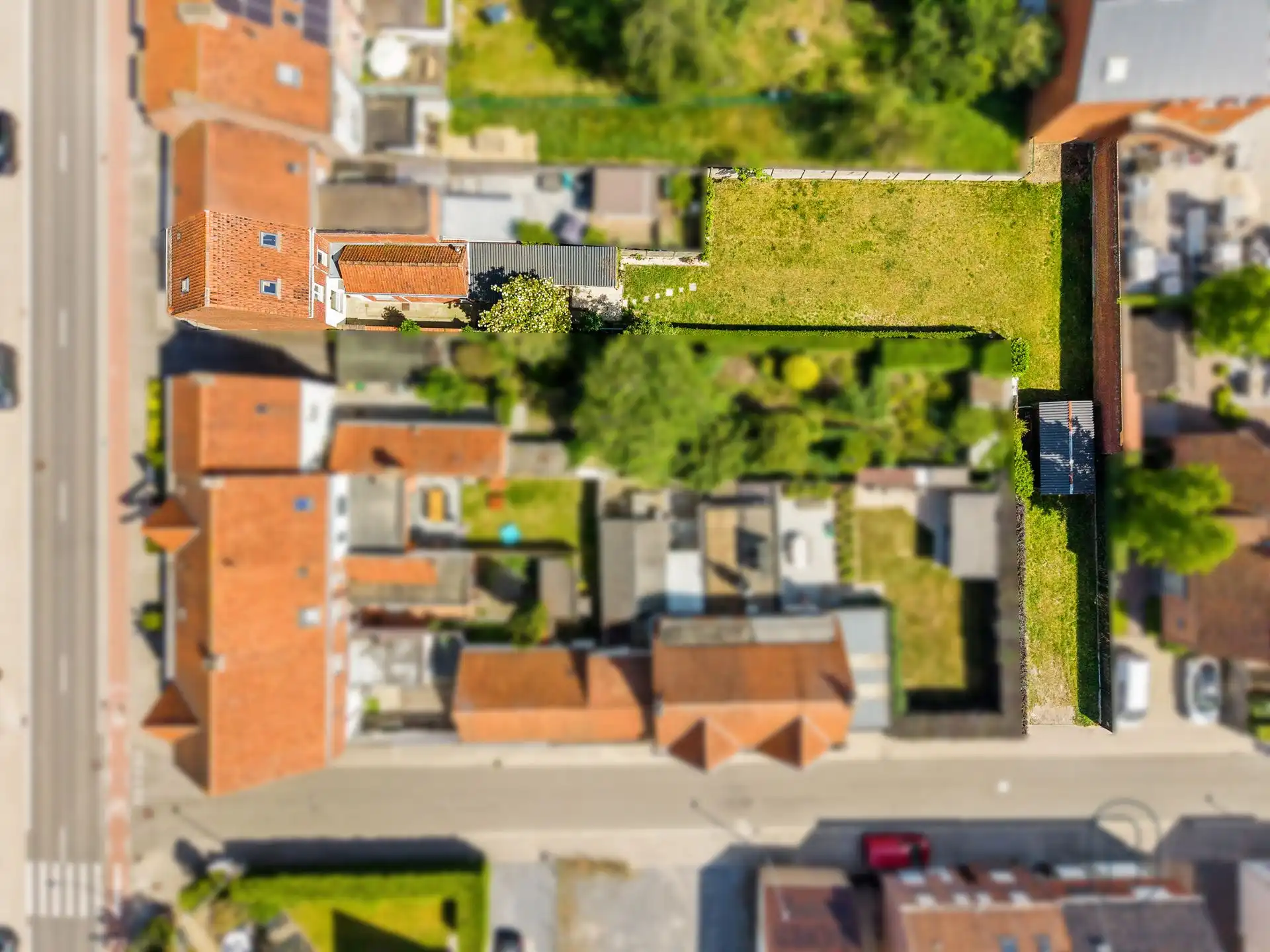 Ruime gezinswoning met 4 slaapkamers en grote tuin! foto 3