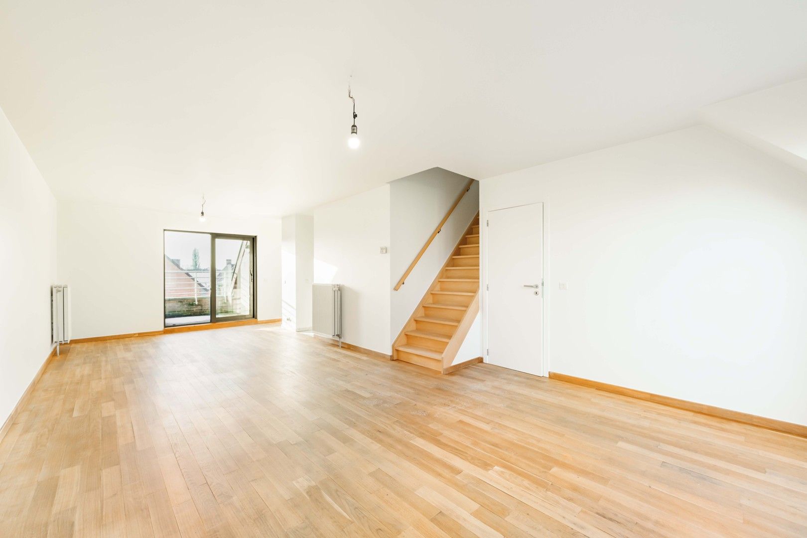 Instapklaar duplex-appartement met 3 slaapkamers te centrum Tielt! foto {{pictureIndex}}