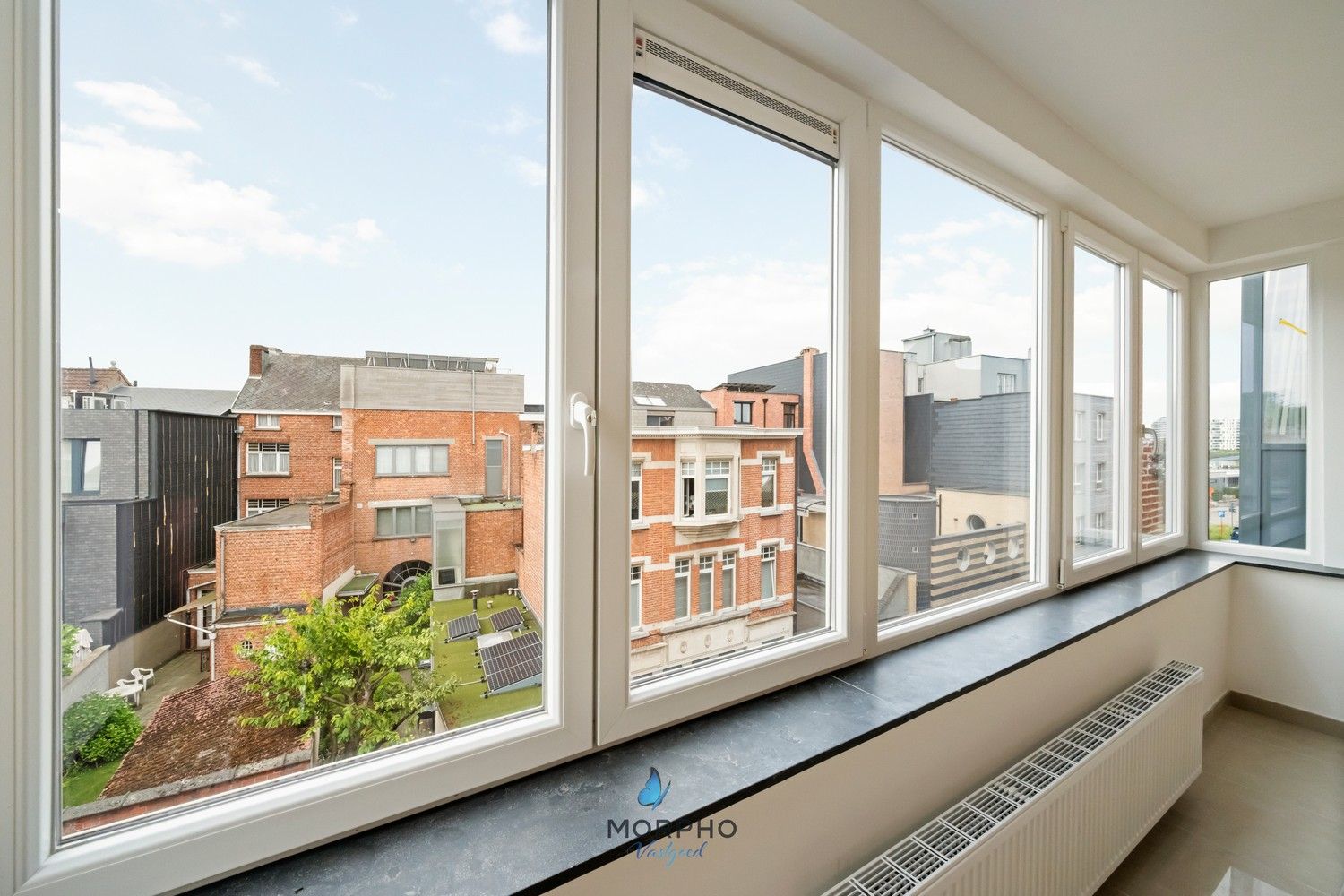 Recent gerenoveerd appartement te huur met uniek Scheldezicht in hartje Temse foto 6