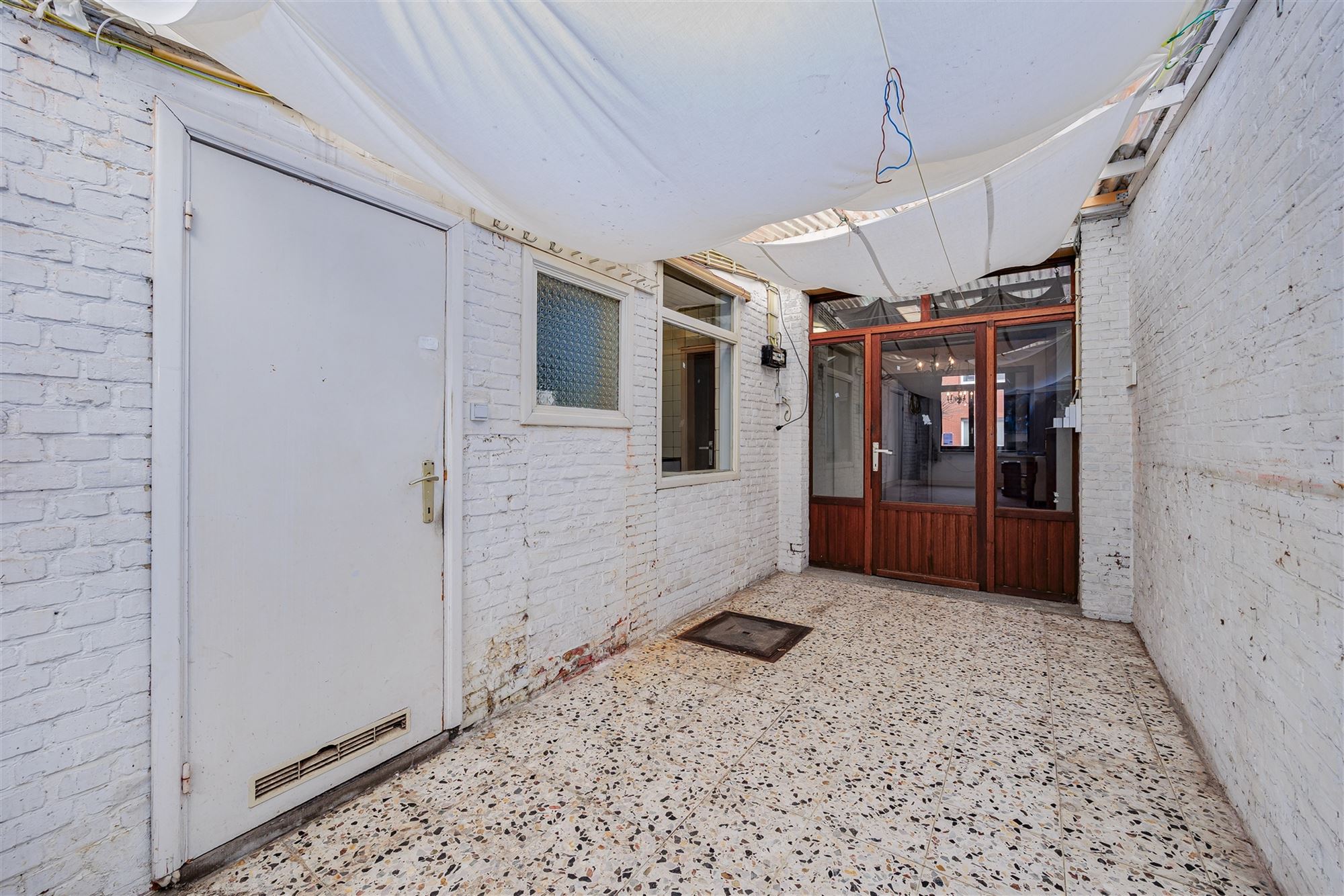 Te renoveren woning met 3-4  slk met gezellige tuin foto 14