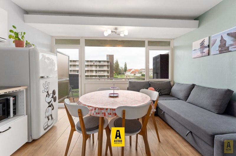 Instapklaar (gerenoveerd) lichtrijk appartement met terras in groen domein! foto 2