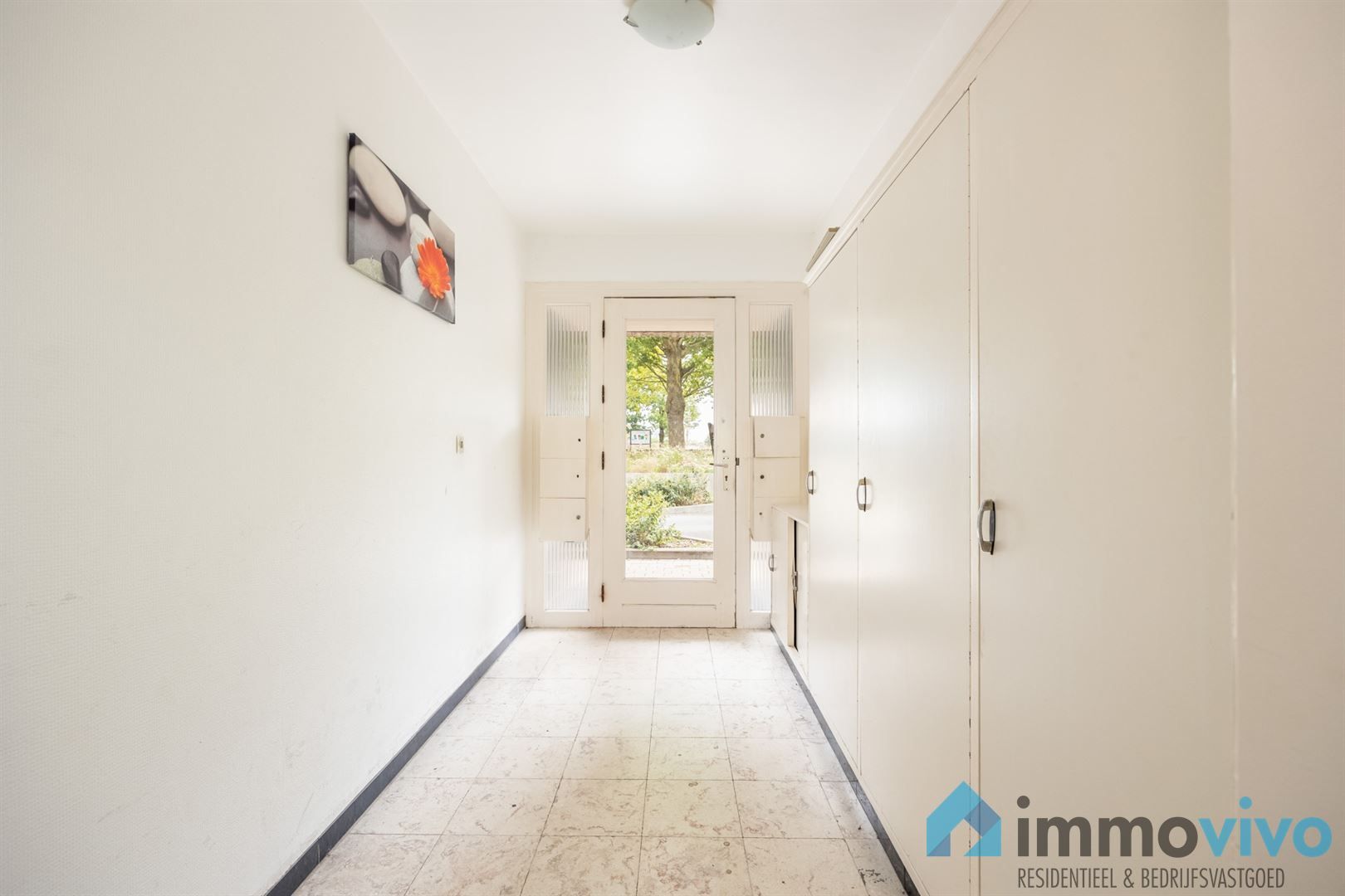 Ruim gelijkvloersappartement met 3 slpk's en koer foto 14