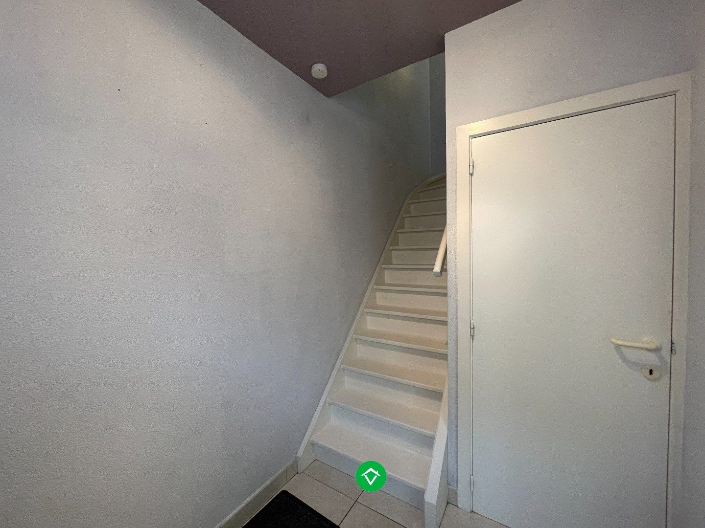 Gezellige rijwoning met 3 slaapkamers, terrastuin en garage te Kachtem foto 2