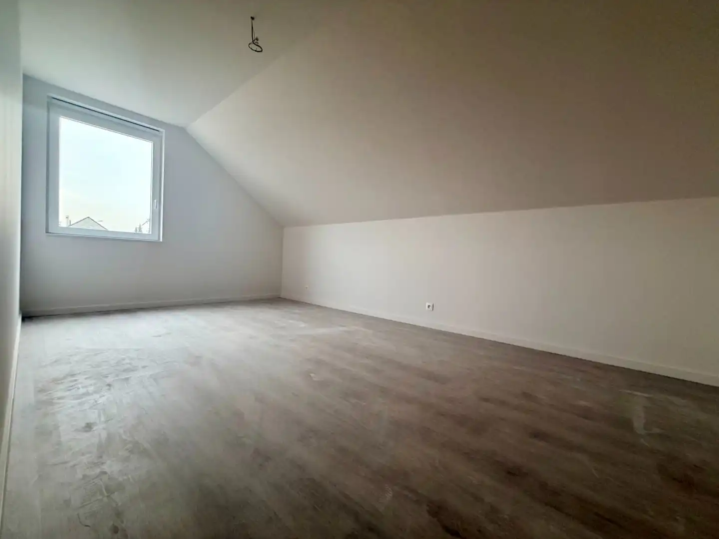 Uitzonderlijk ruime halfopen woning! foto 16
