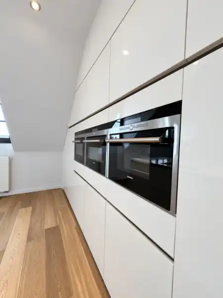 Stijlvol dakappartement met terras en veel privacy in het centrum van Geel foto 11