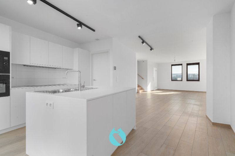 Ontdek dit prachtige duplex-nieuwbouwappartement, met drie slaapkamers en twee badkamers foto 5
