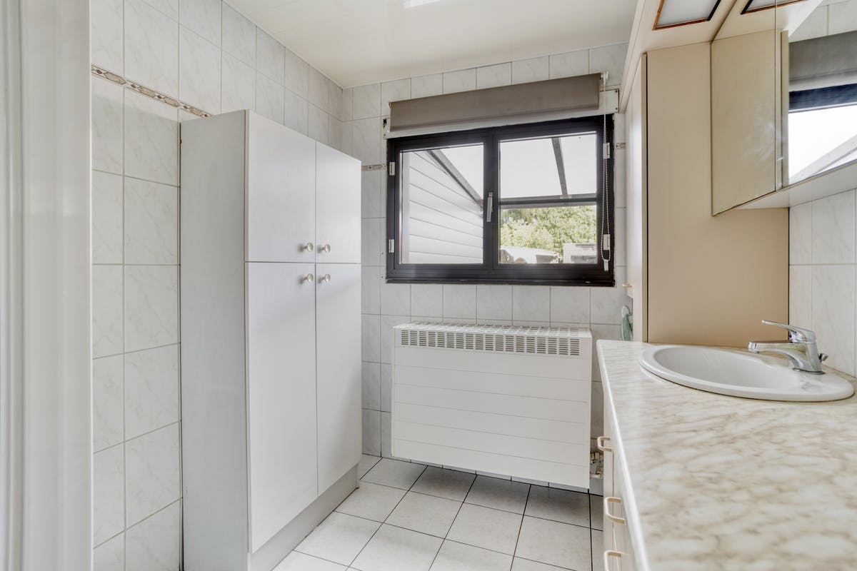 huis te koop in centrum Turnhout met wegenis achteraan  foto 12