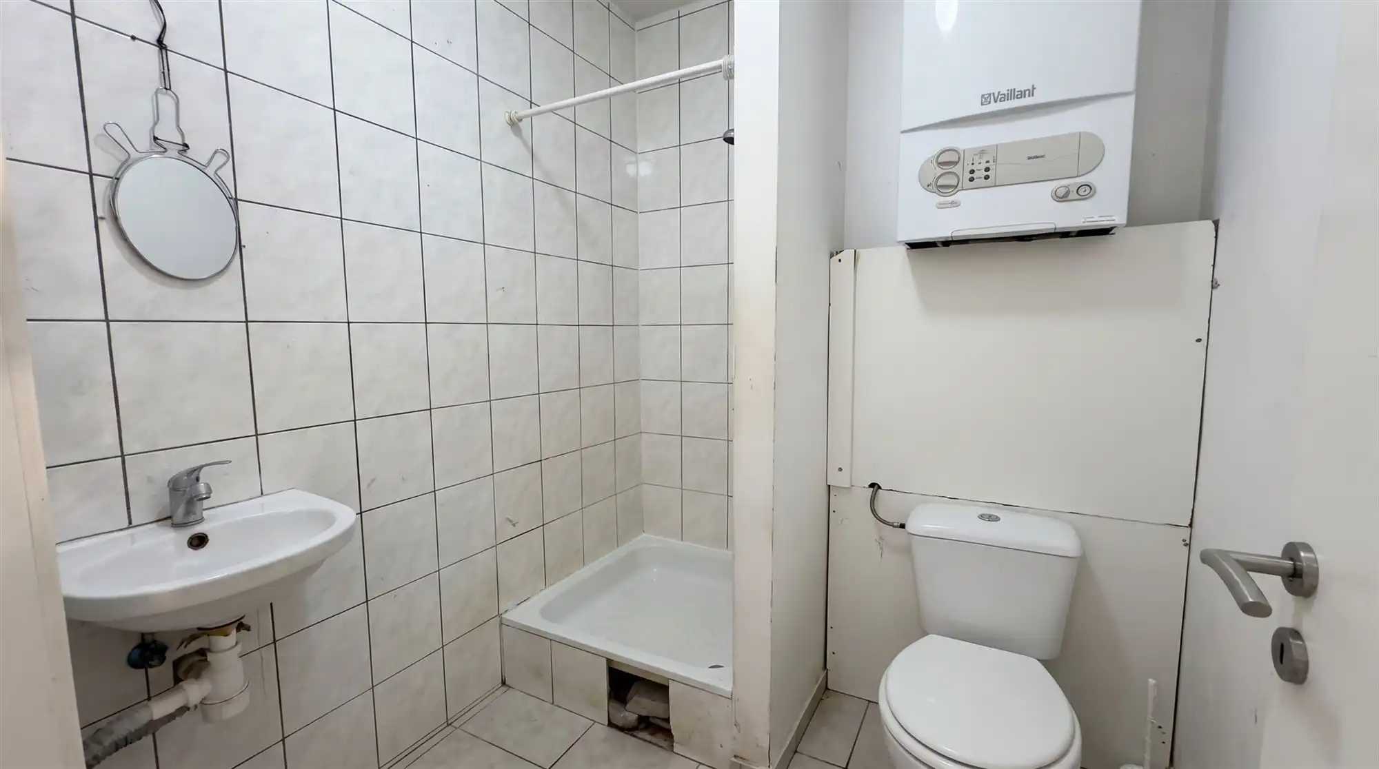Rendabele opbrengsteigendom met 3 appartementen en handel. foto 14