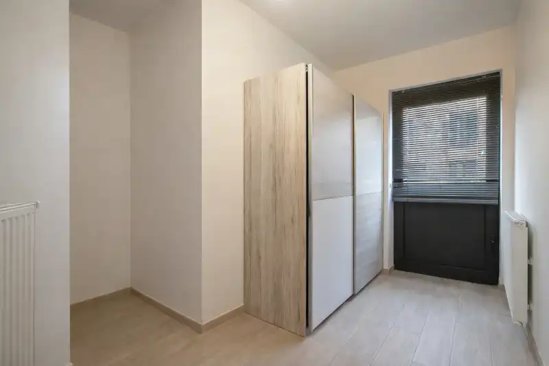 Ruim gelijkvloers appartement (2 slpk) met terras en tuin! foto 7