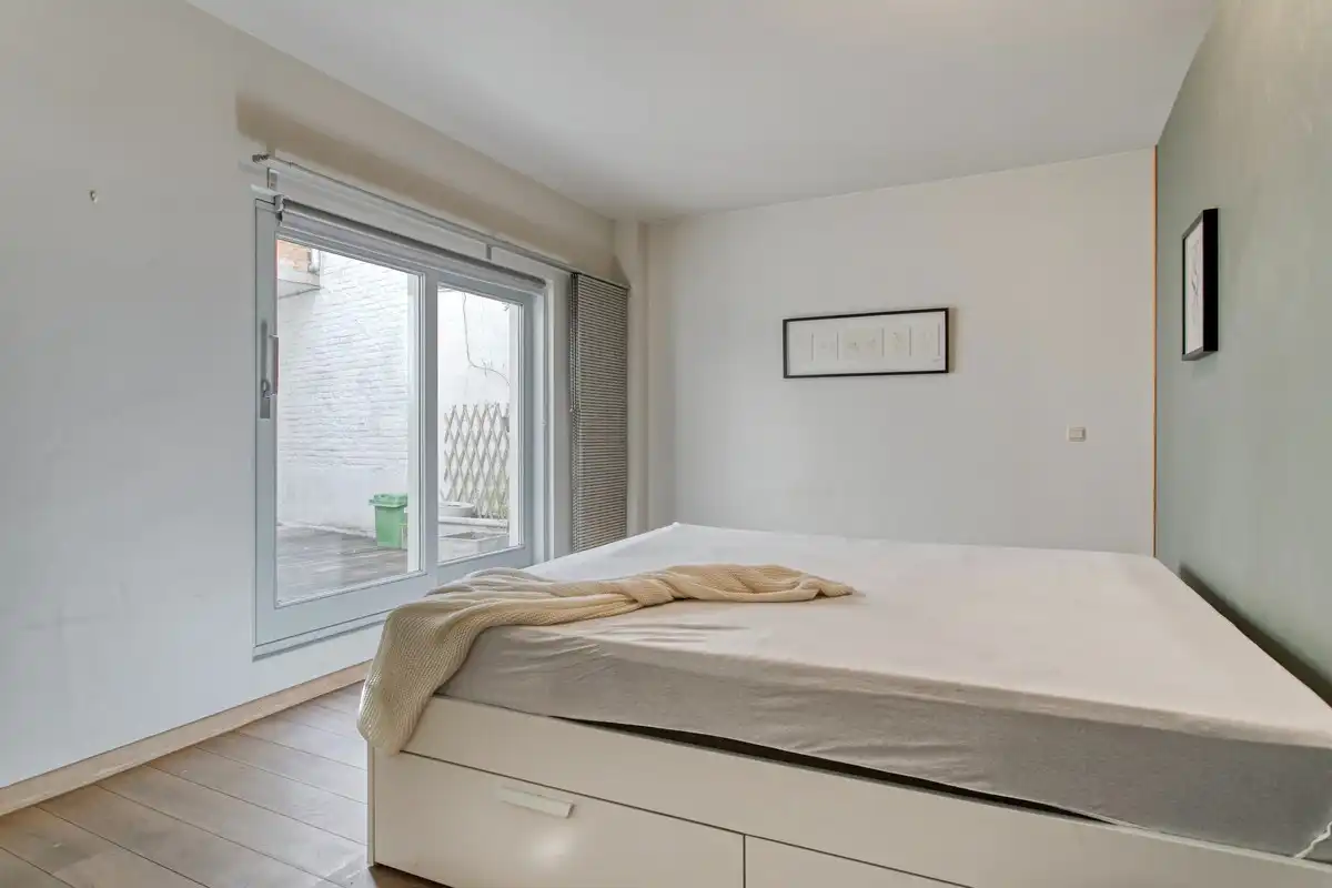 Karaktervol appartement met groot terras (20m²) in het midden van de stad aan het Karmelietenklooster en het Gravensteen. foto 7