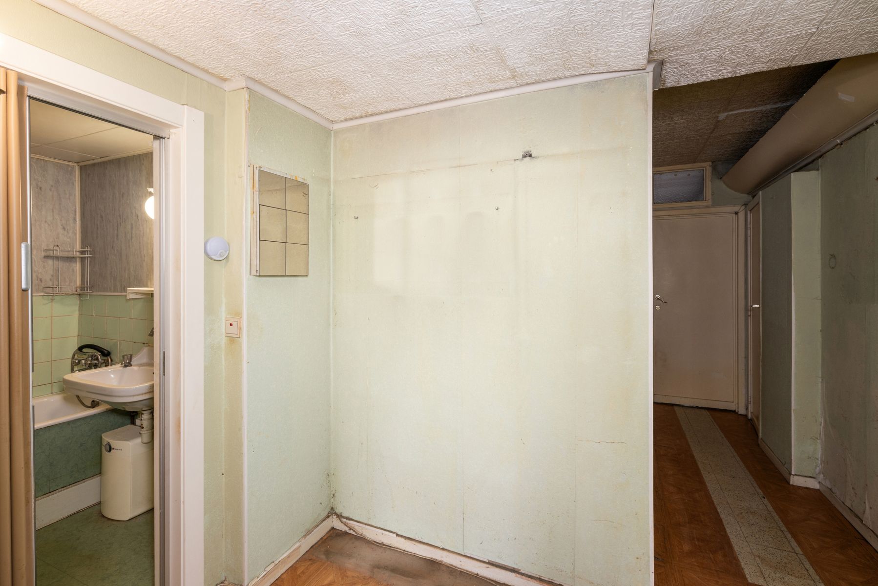 Te renoveren 2-slaapkamer appartement in het centrum van Erembodegem foto 8