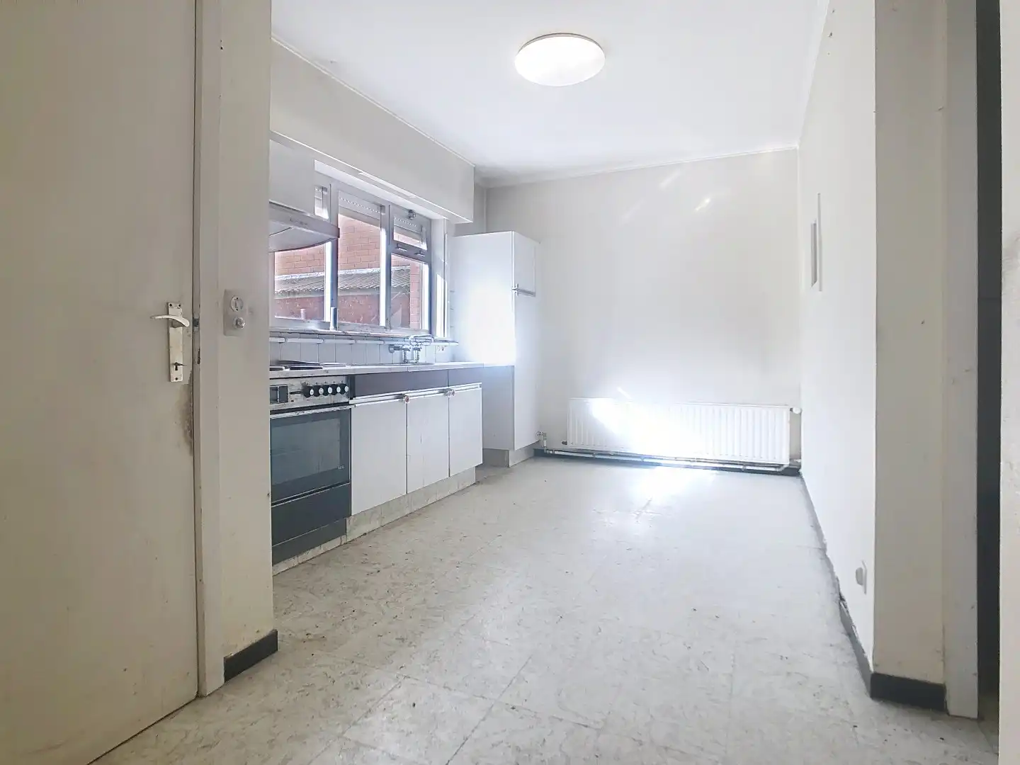 Te renoveren half-open bebouwing op 600m² in het centrum van Staden foto 3