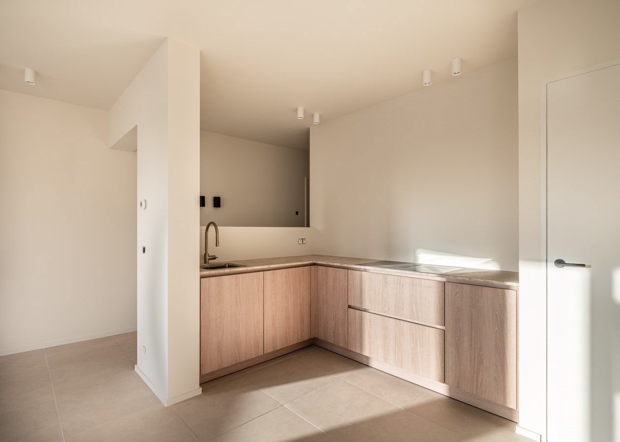 Stijlvol  gerenoveerd 2 slaapkamer appartement op de markt in de Panne foto 7