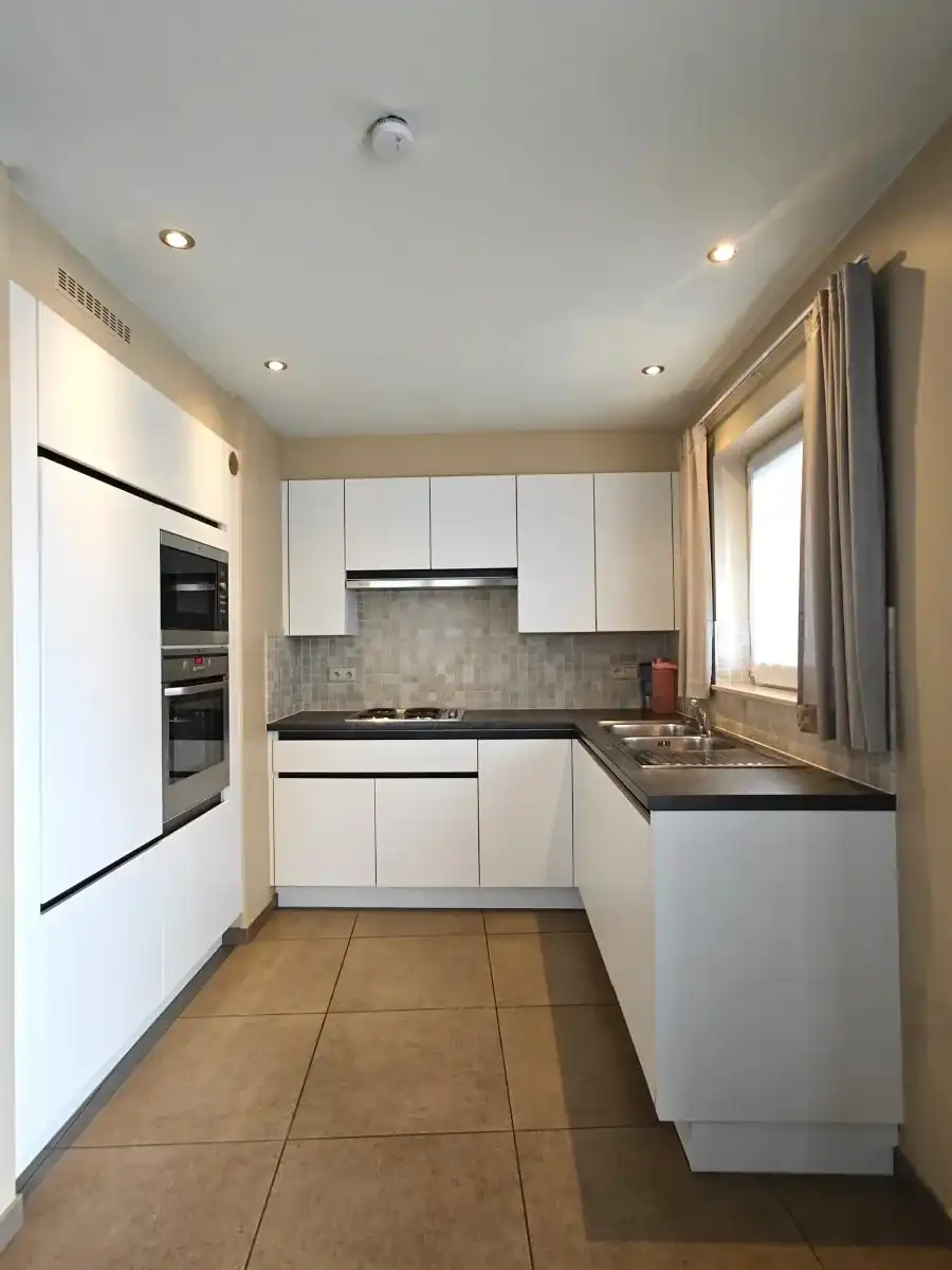 Beselare – Instapklaar gelijkvloers appartement met 2 slaapkamers en parkeerplaats foto 4