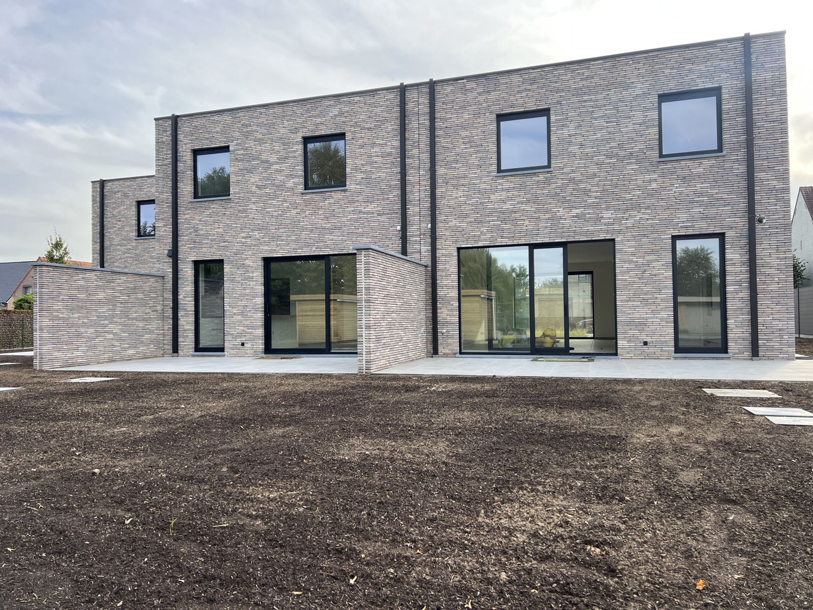 Te huur - Nieuwbouwwoning met  zonnige tuin en carport foto 12
