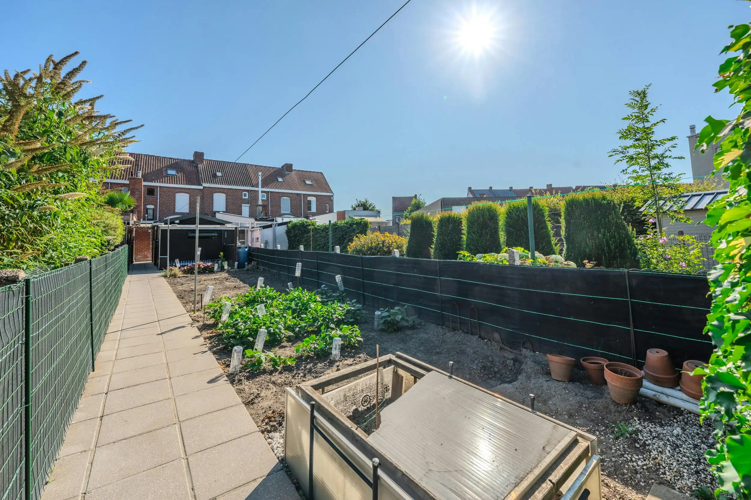 Huis te koop in Ieper met zongerichte tuin én garage foto 18