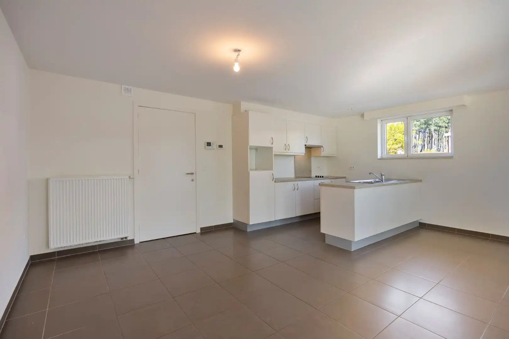 Ruim gelijkvloers 2 slaapkamer appartement met garage op centrale ligging te Dessel foto 7