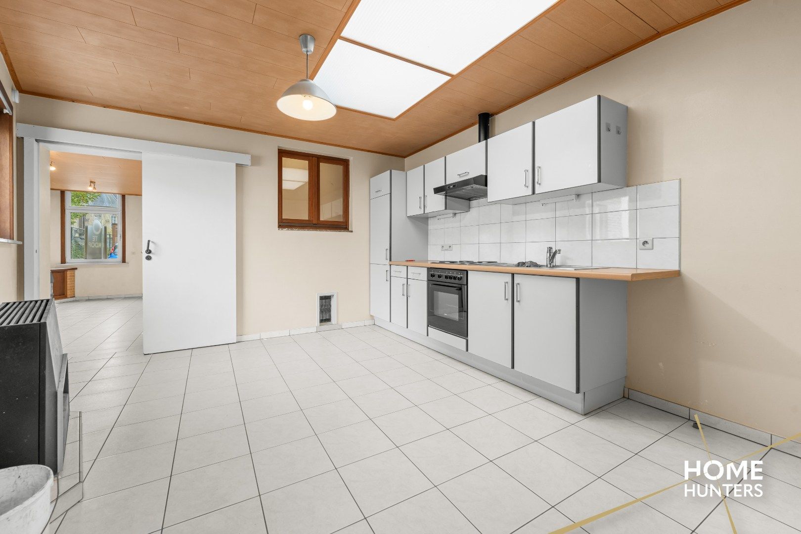 Halfopen gezinswoning met 3 slpks, carport en diepe tuin in Dikkebus foto 13