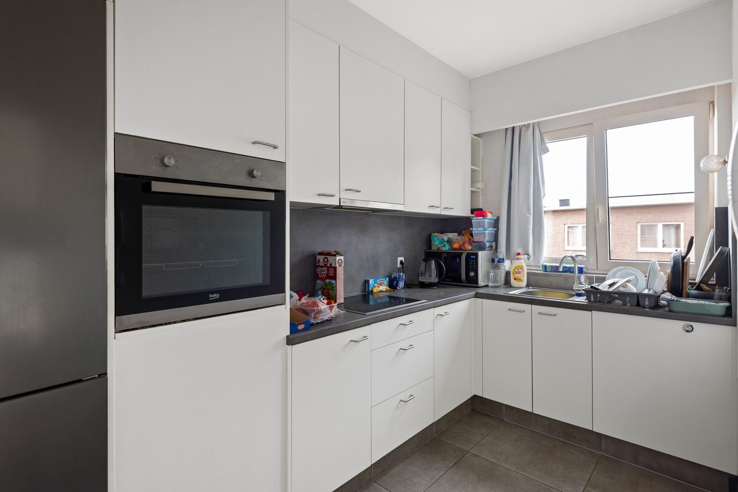 Opbrengsteigendom met 2 appartementen, tuin en garage te koop in Deurne! foto 13