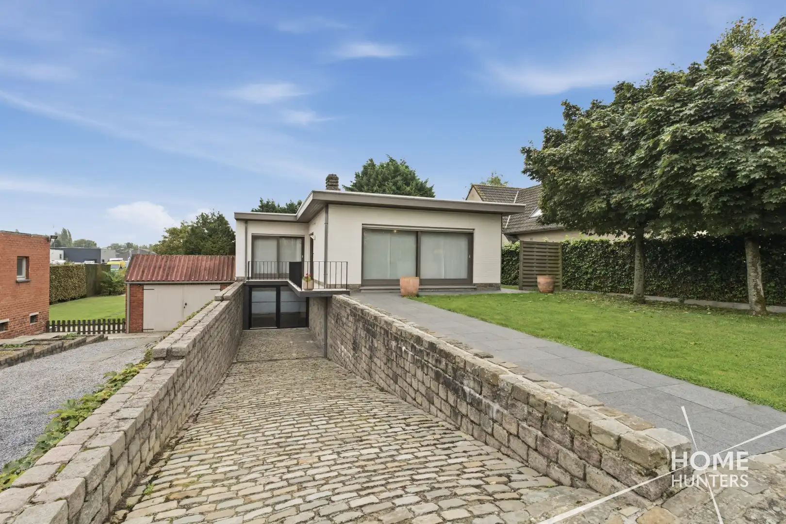 RUSTIG GELEGEN BUNGALOW MET RUIME TUIN EN VEELZIJDIGE KELDERRUIMTE foto 32