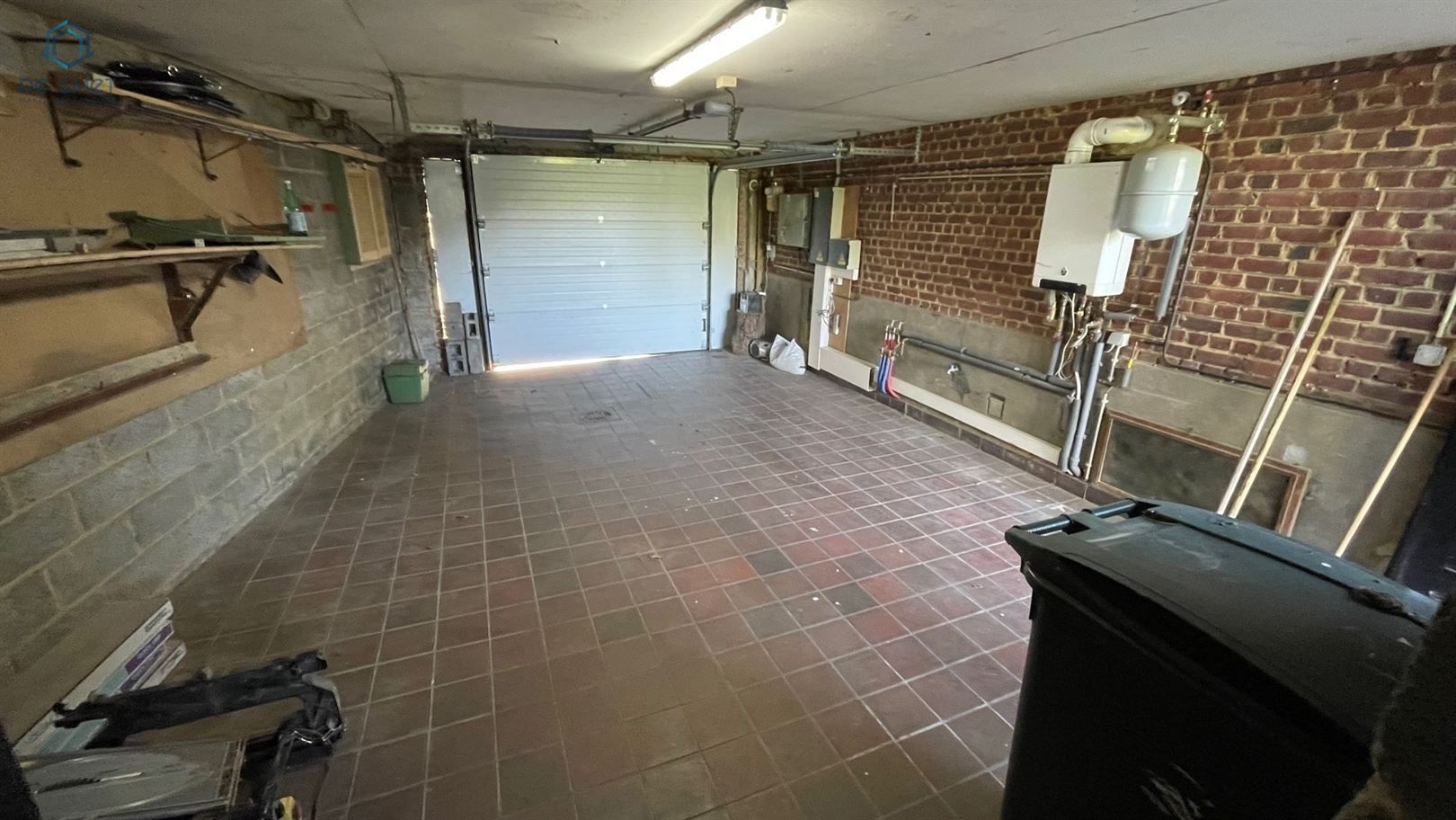 Instapklare gezinswoning met 3 slaapkamers, garage, atelier en prachtige tuin in het hart van de Vlaamse Ardennen foto 12
