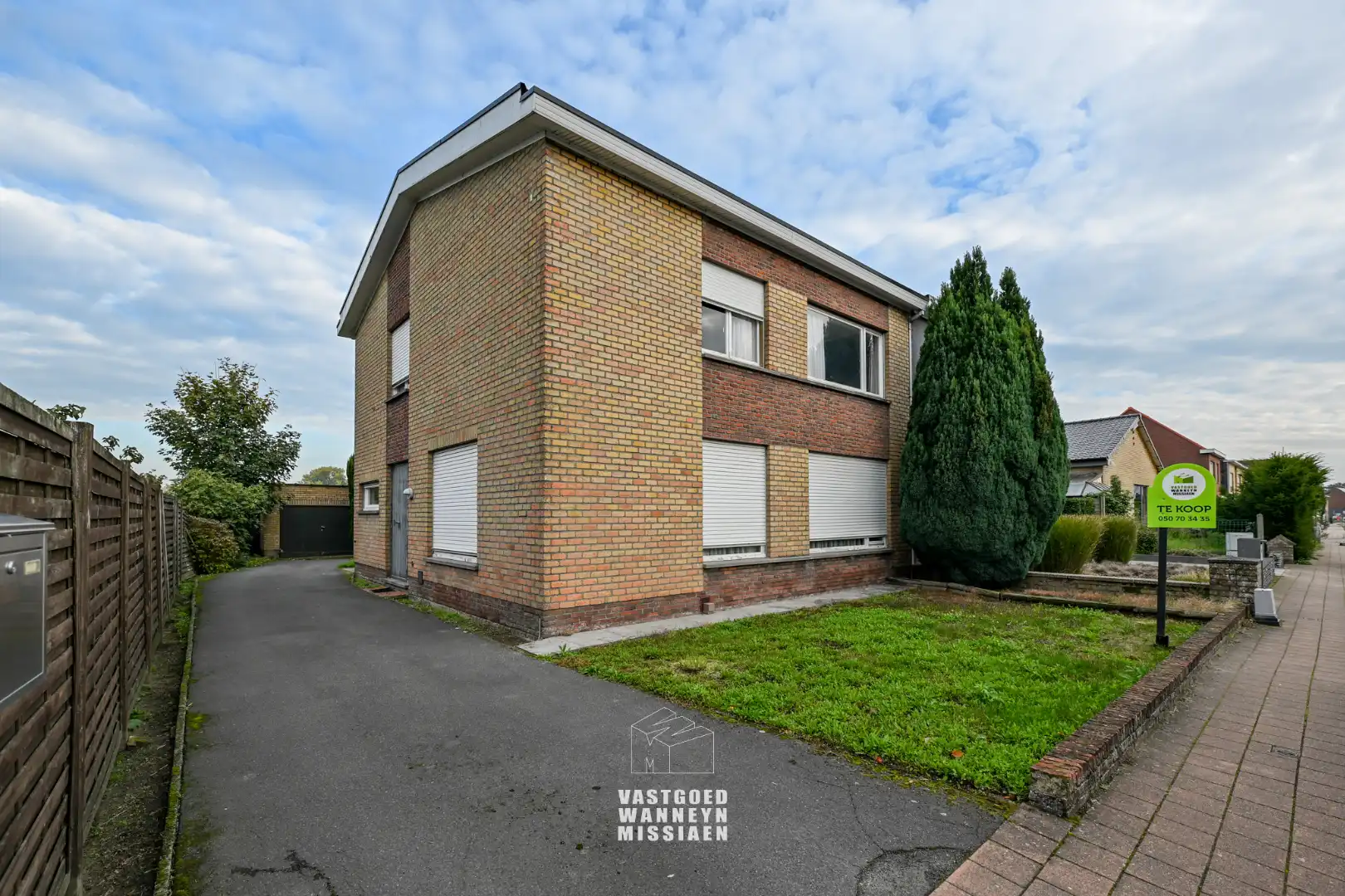 Ruime halfopen bebouwing met 4 slaapkamers, garage en tuin foto 2