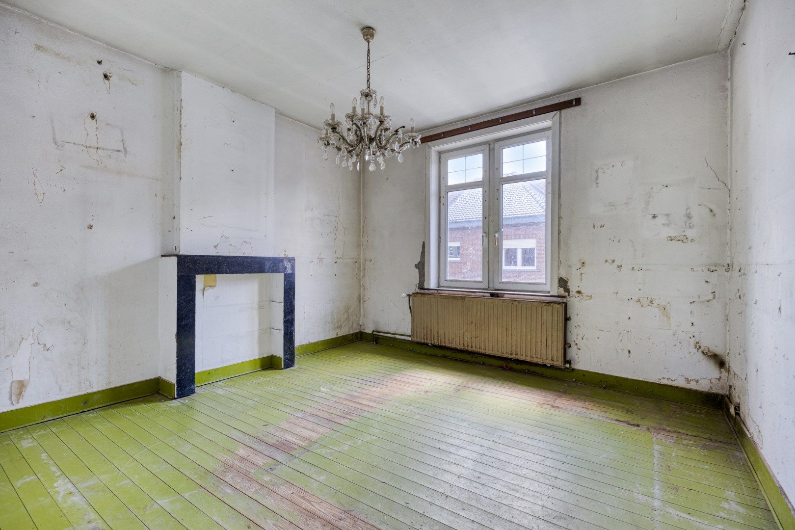 Te renoveren halfopen bebouwing met 3 slaapkamers en ruime tuin in hartje Kessel-Lo  foto 12