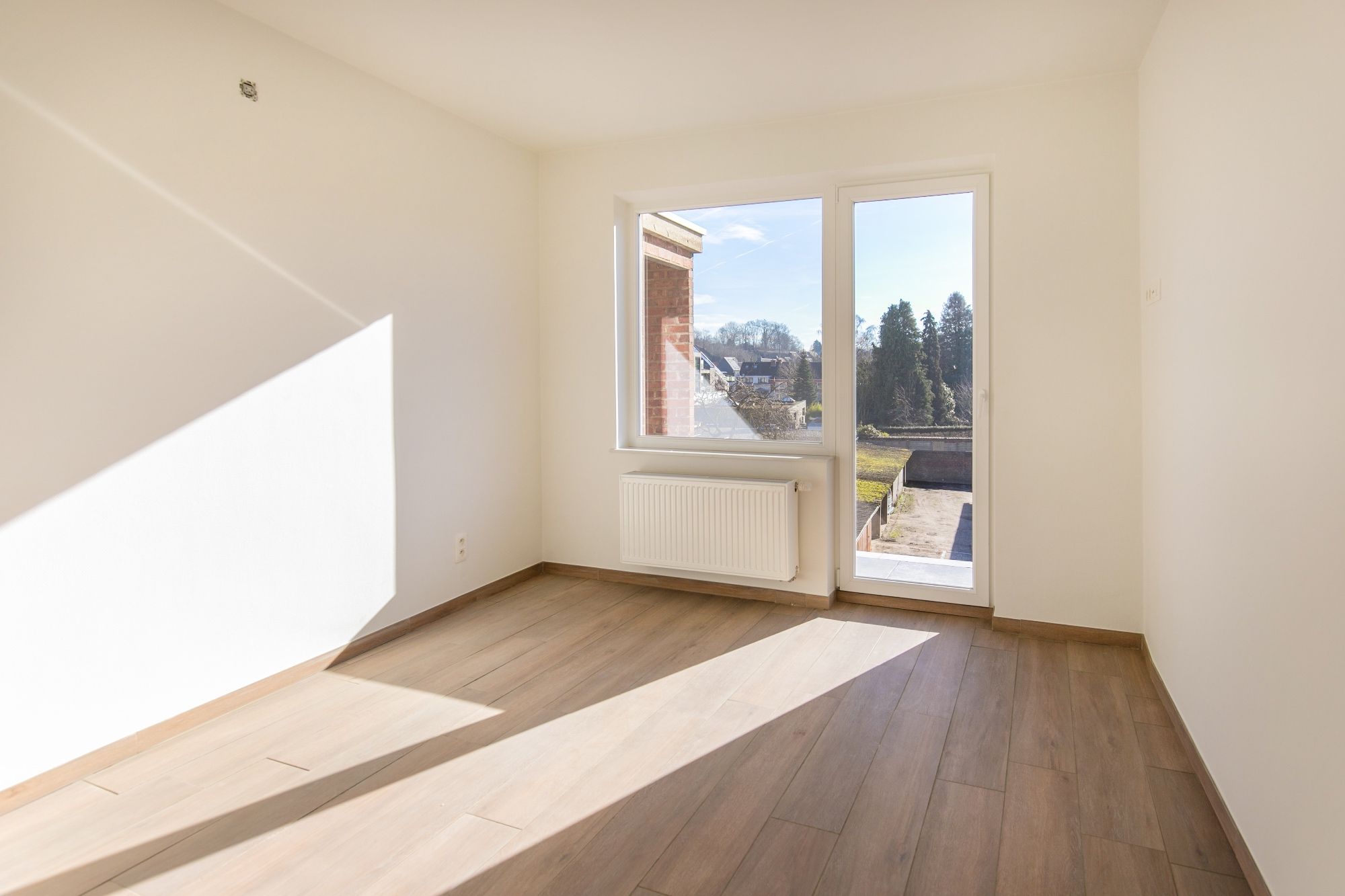 Ruim appartement met 2 slaapkamers in het centrum van Bilzen! foto 12
