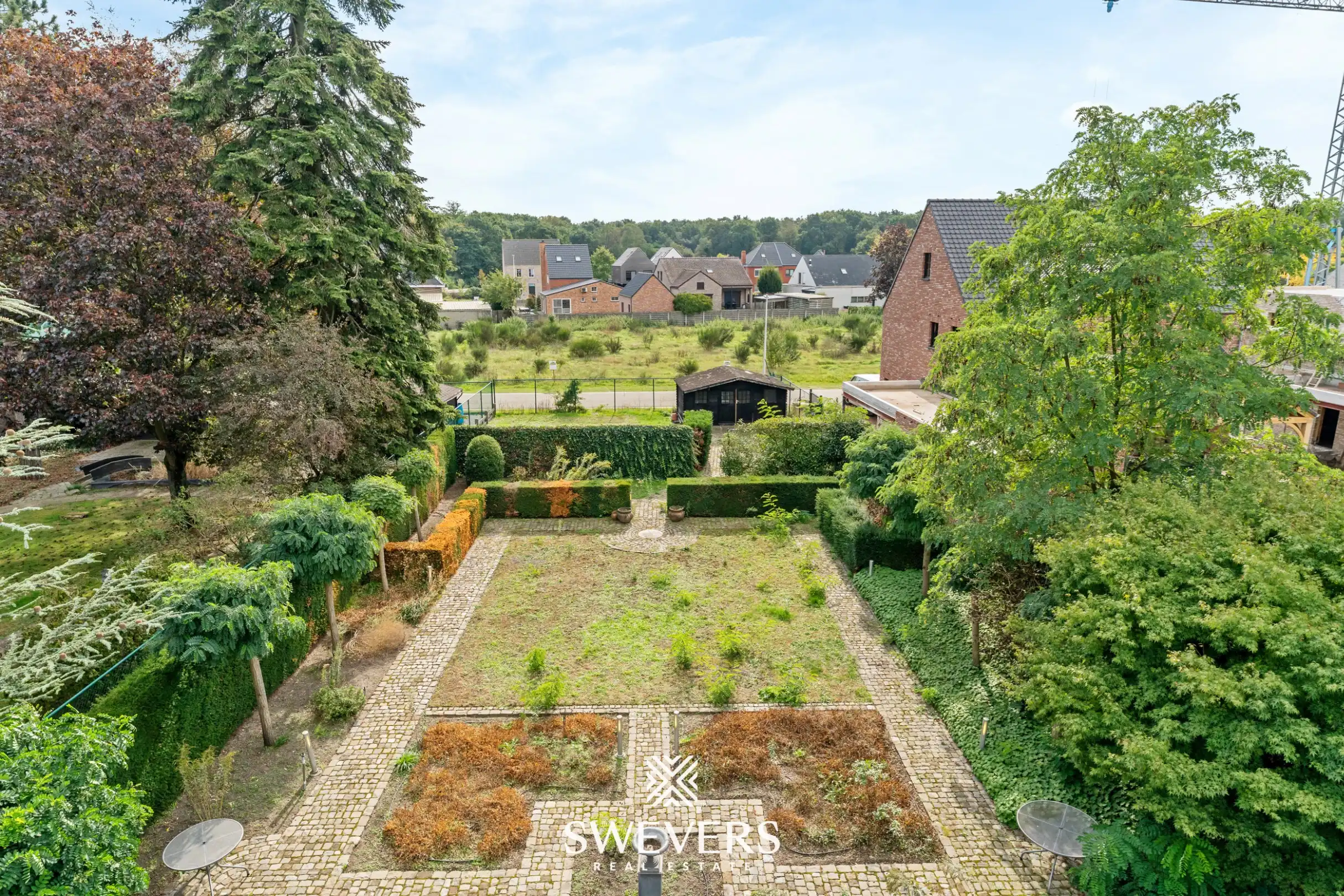 Knappe woning met orangerie, mogelijkheid tot 4 slpk en achterliggende bouwgrond foto 31