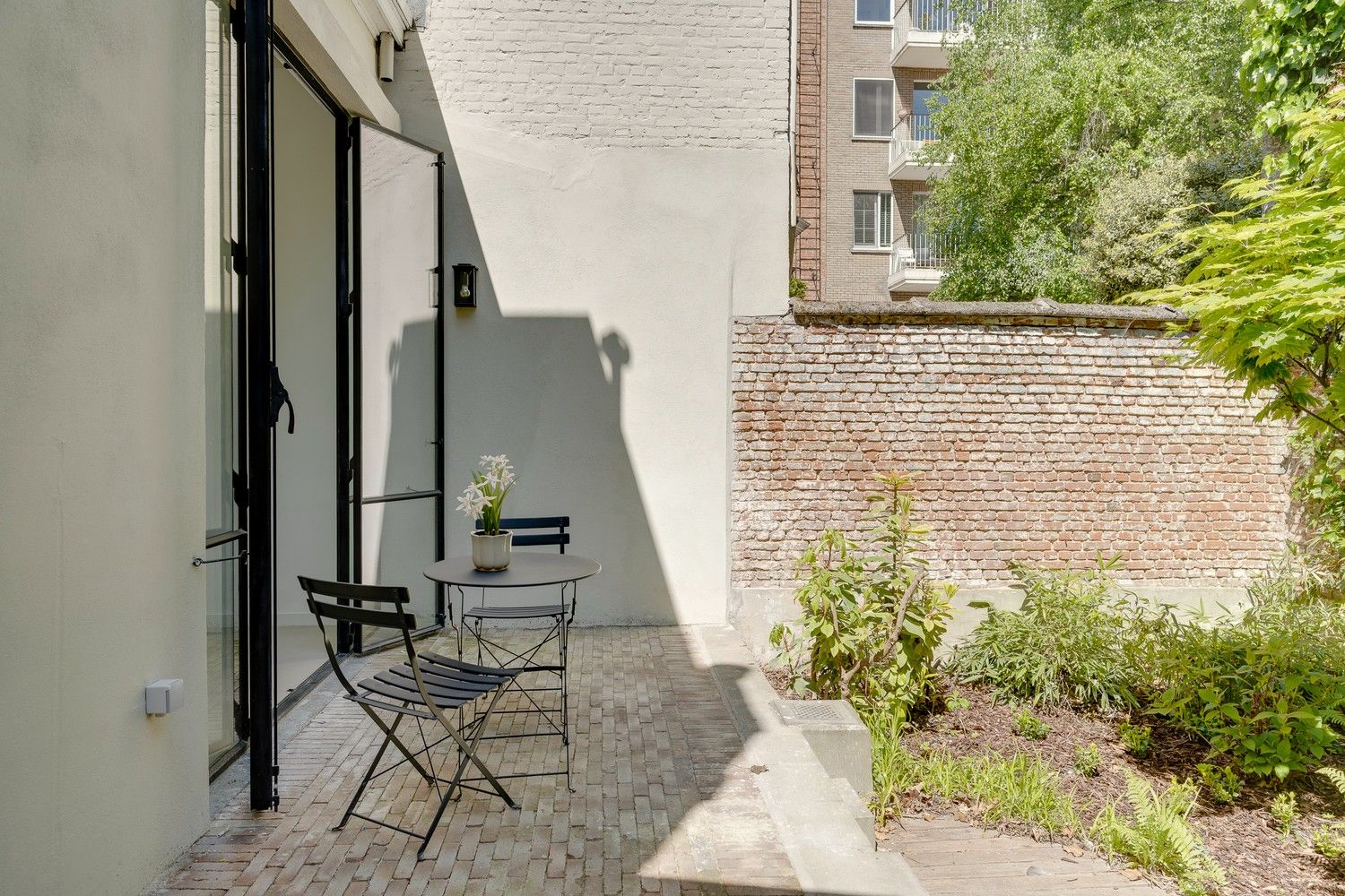 Karaktervol herenhuis met 6 slaapkamers, stadstuin en hoogwaardige afwerking foto 12