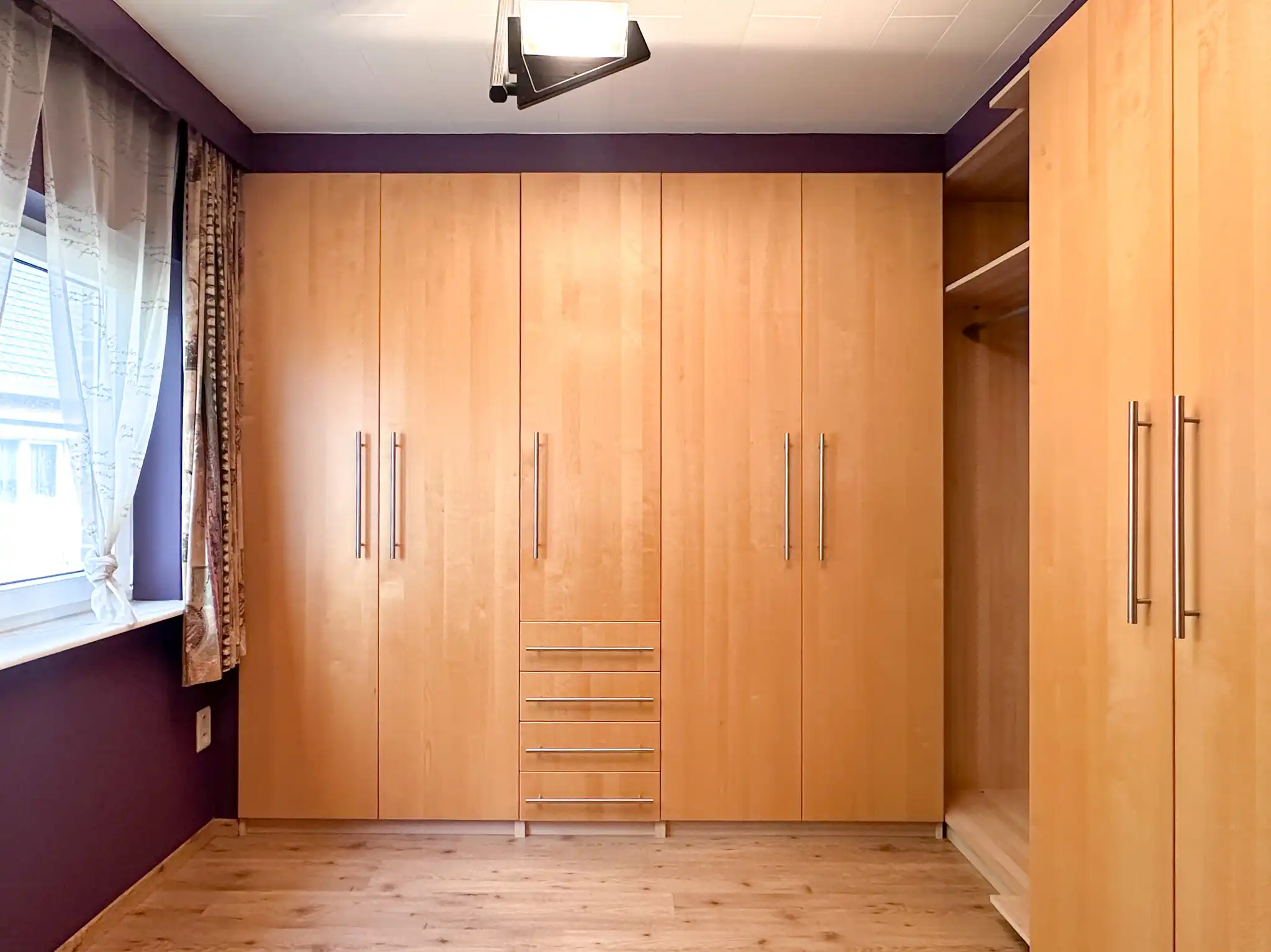 Woning met twee slaapkamers, dressing, garage en tuin te huur in het hartje van Melsele foto 13