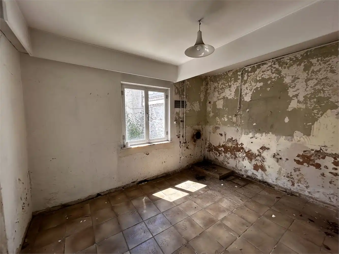 Te renoveren handelshuis met woonst foto 18