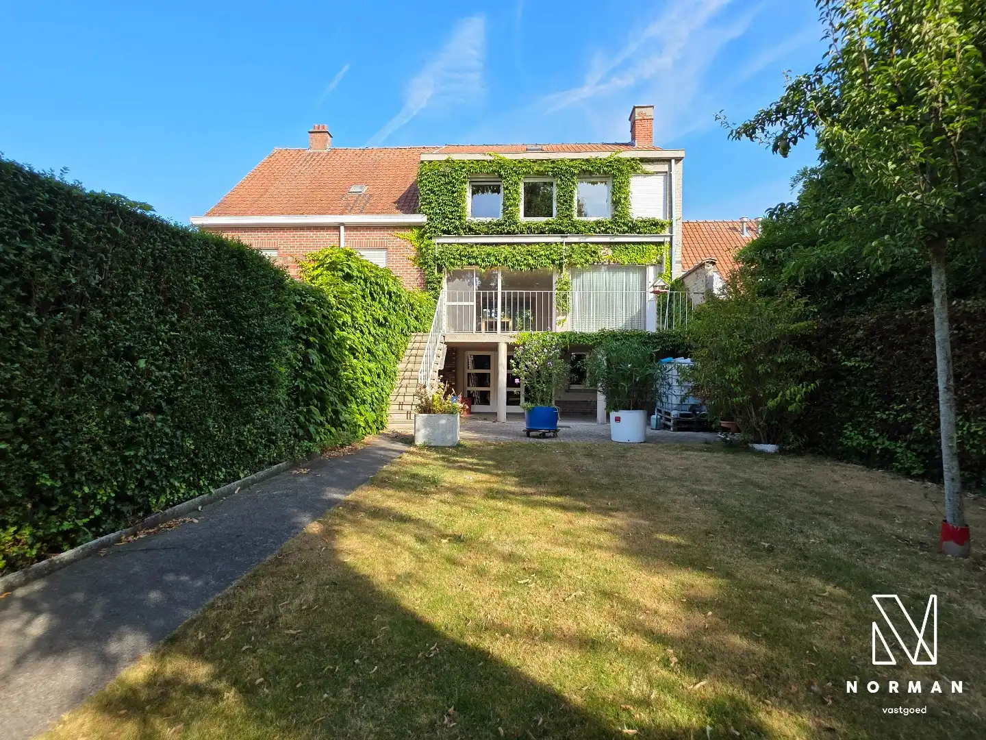 Ruime woning met mooie tuin in rustige straat in Beveren-Leie foto 2
