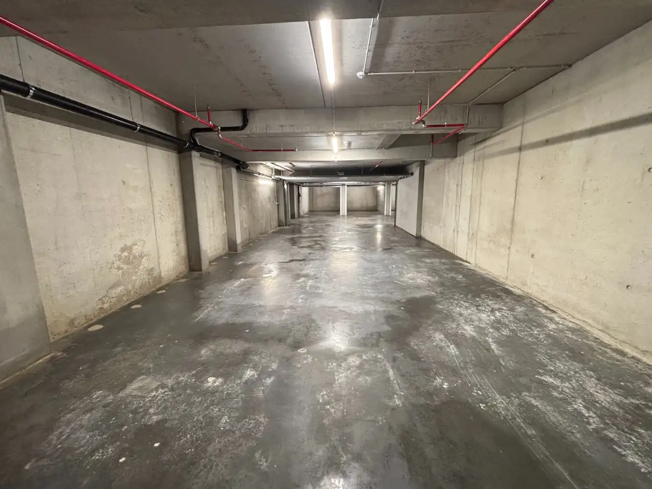 Uiterst ruime garagebox te koop - 78 m2 - goed voor 4 voertuigen foto 5