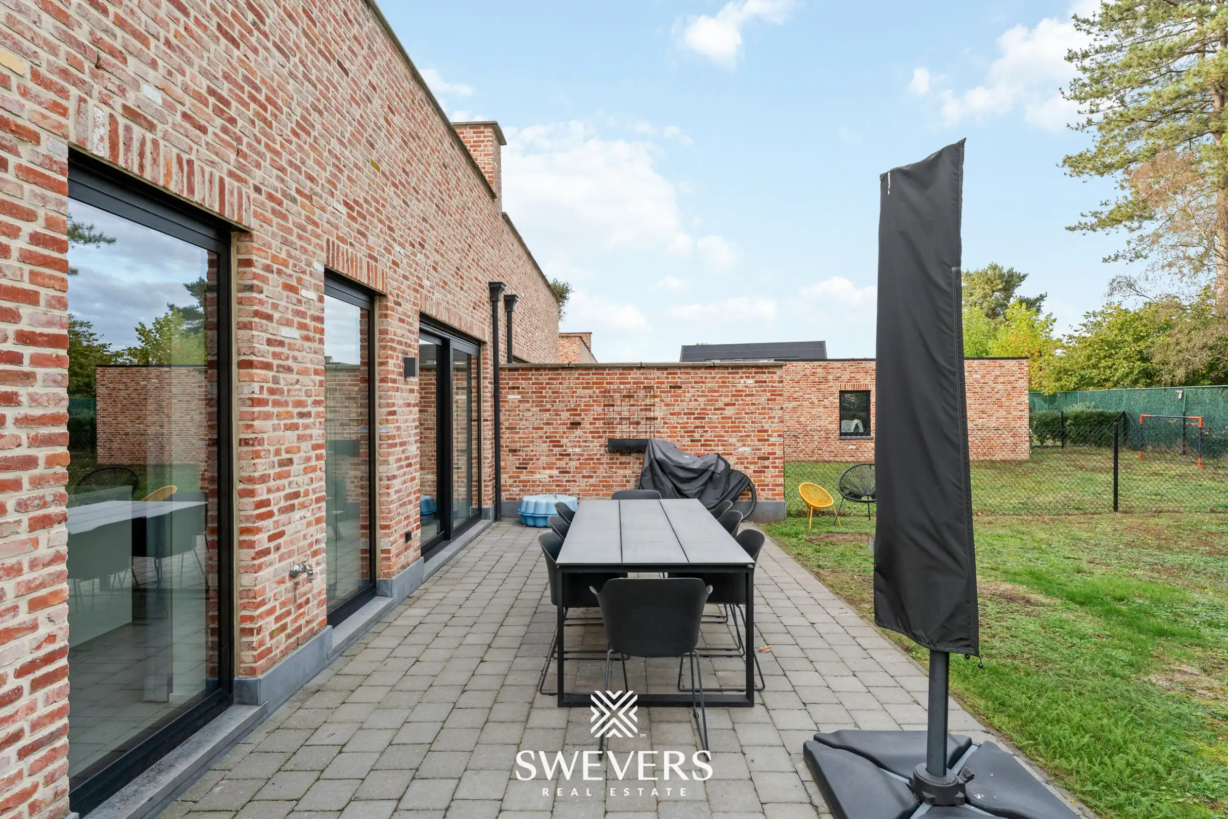 Instapklaar gelijkvloers 2 slpk-appartement met terras en tuin in Heusden. foto 19
