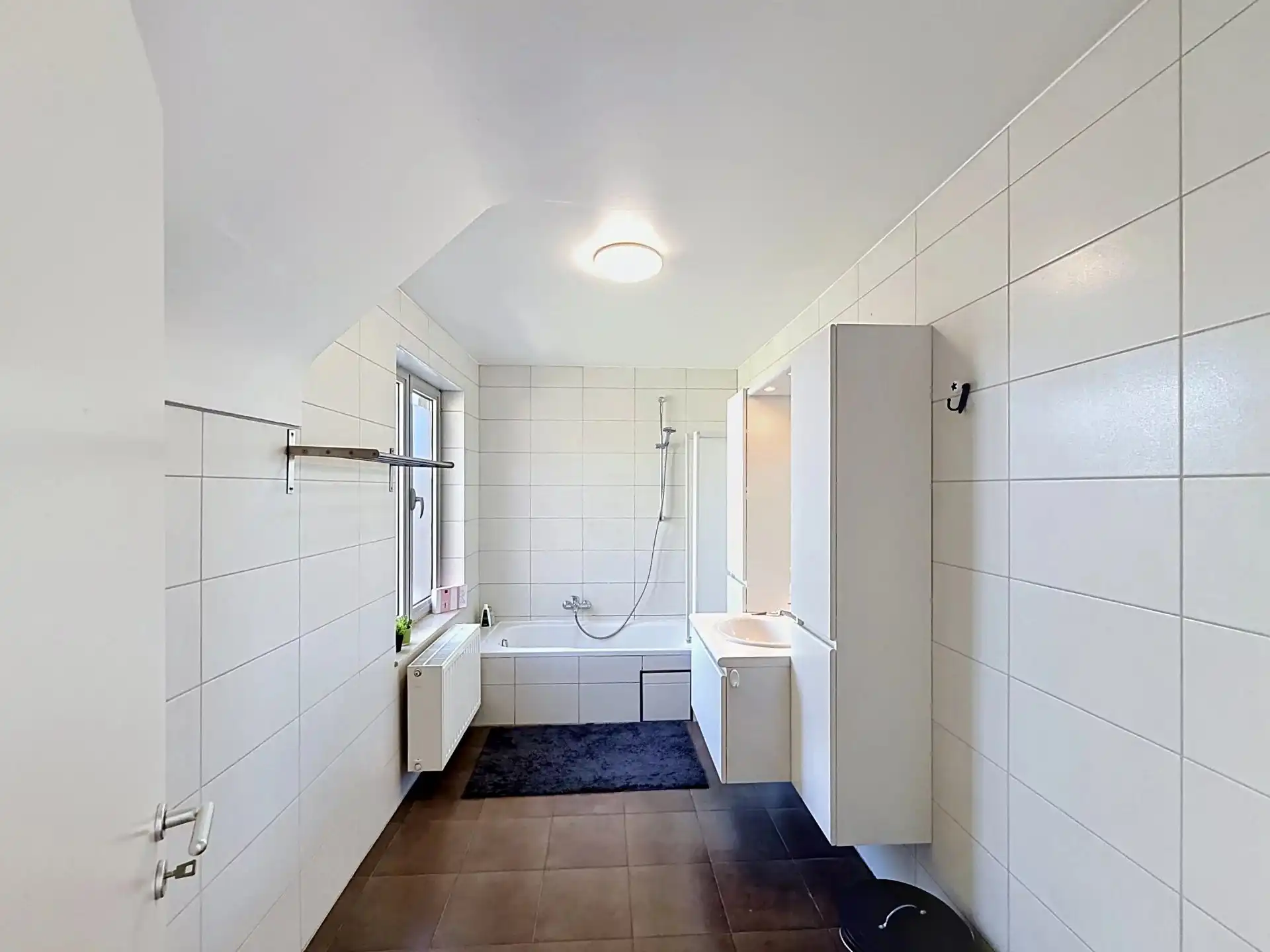 Duplex appartement met 2 slaapkamers, 2 terrassen en ondergrondse staanplaats en berging. foto 7