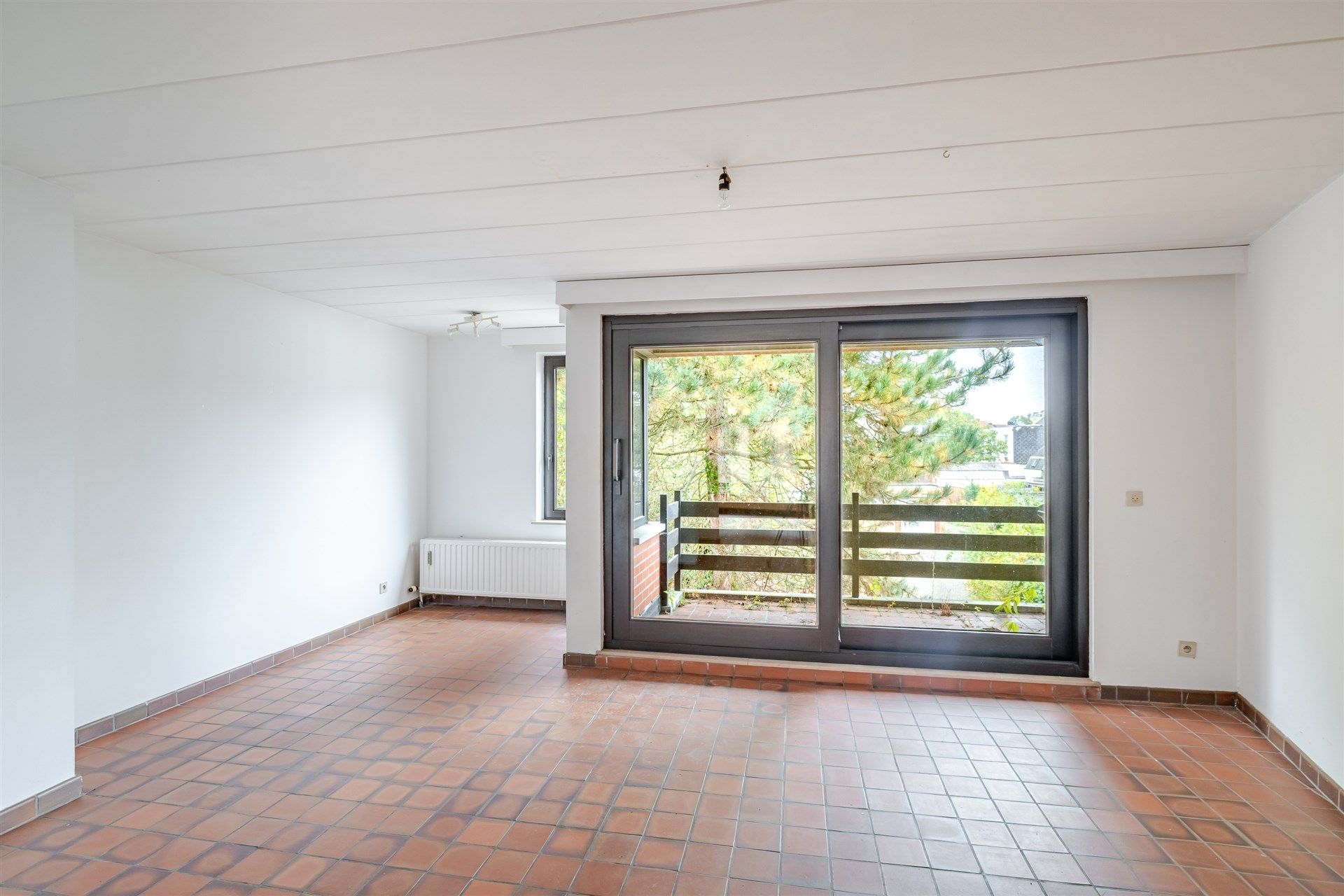 Opbrengsteigendom bestaande uit 4 appartementen + 22 garageboxen + magazijn/werkplaats foto 5