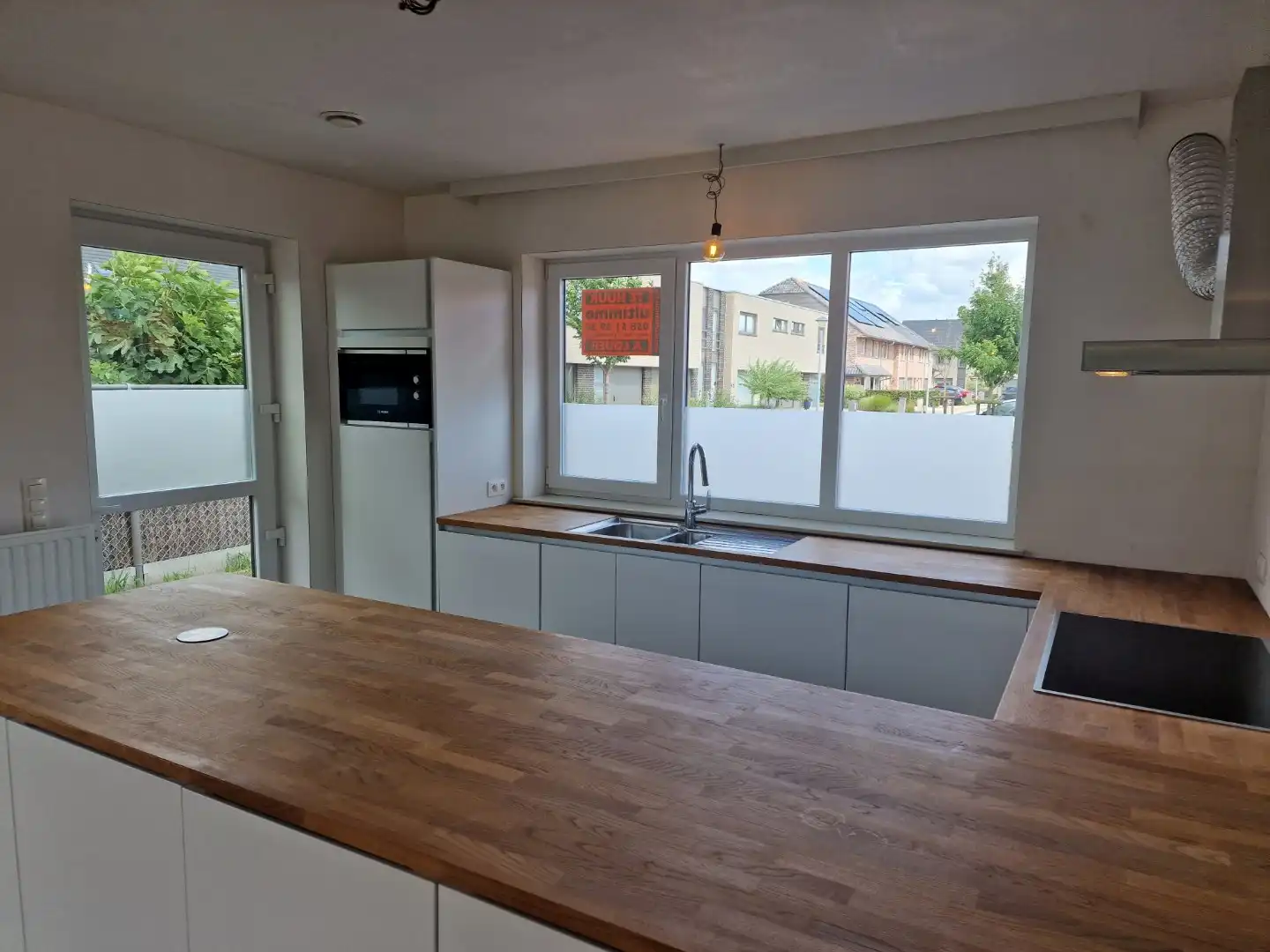 Recente halfopen woning met zonnige tuin  foto 2