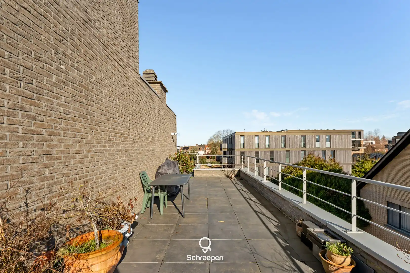 Uniek penthouse met riant zonneterras (115 m²) en 2 slpks in Zonhoven-centrum! foto 17