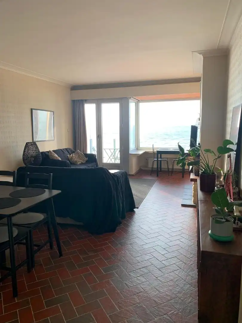 Gemeubeld appartement op zeedijk - frontaal zeezicht foto 10