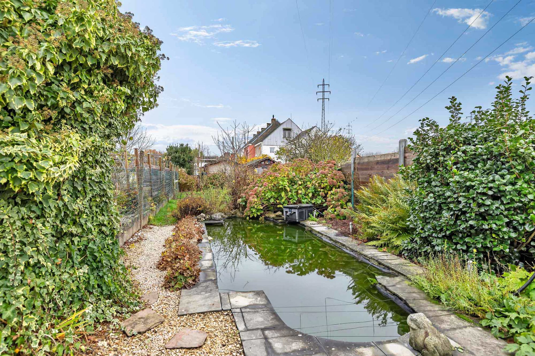 Ruime instapklare woning met 3 slpks en tuin foto 27