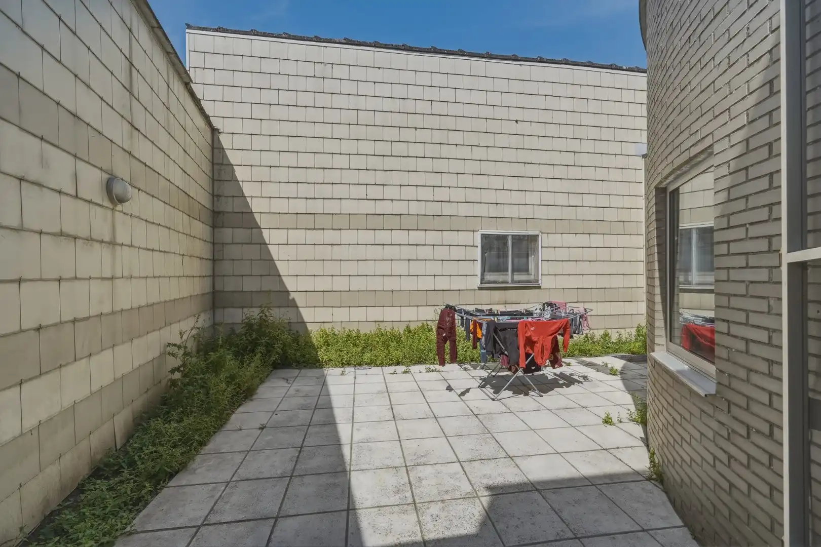 Verhuurd appartementsgebouw met 3 woonentiteiten foto 9