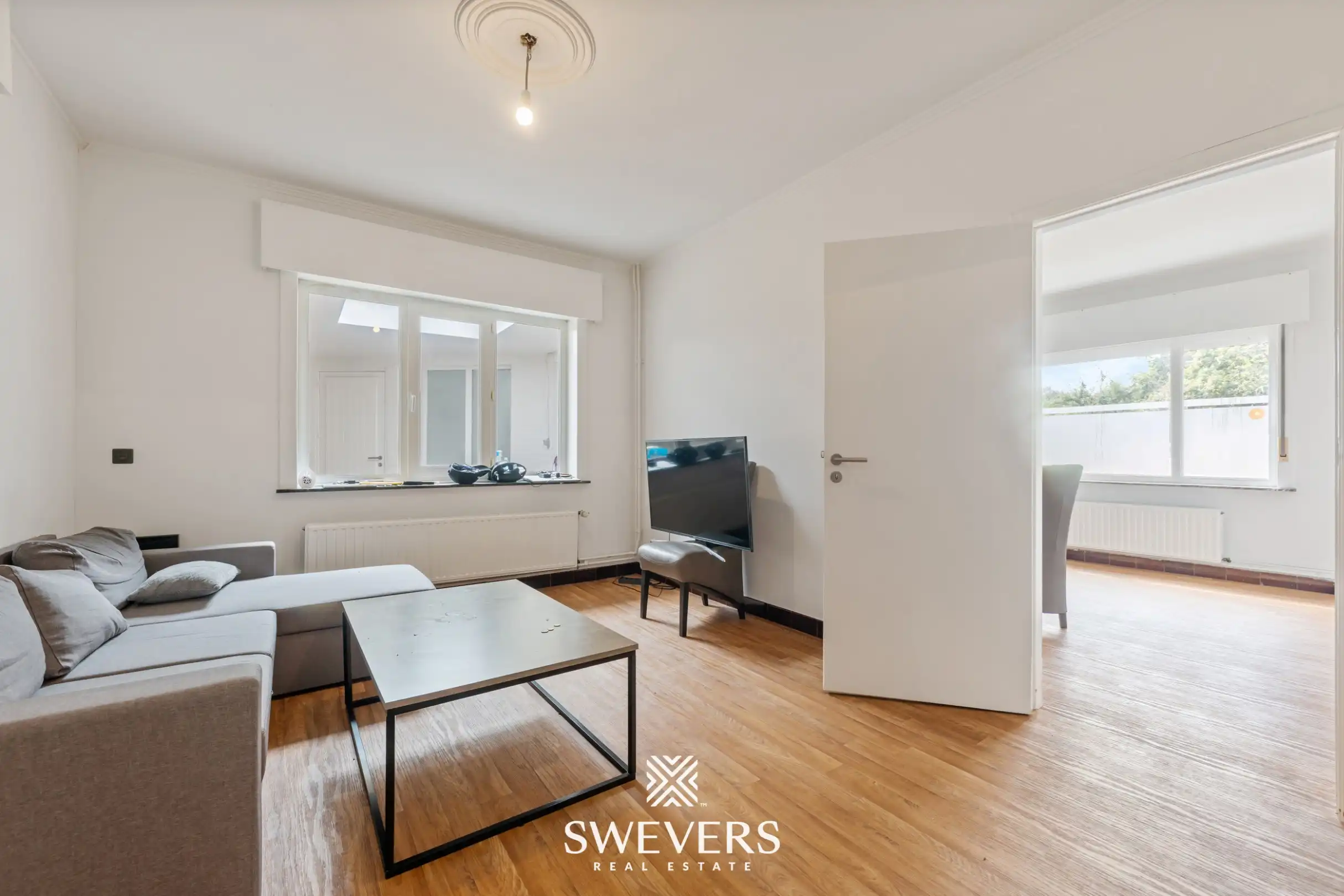 Te renoveren woning met 4 slaapkamers en 4 garages te Beringen foto 5