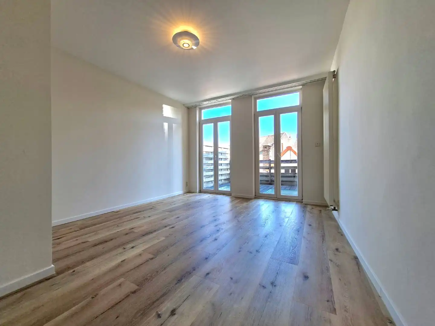 Ruim triplex appartement met 2 terrassen foto 9