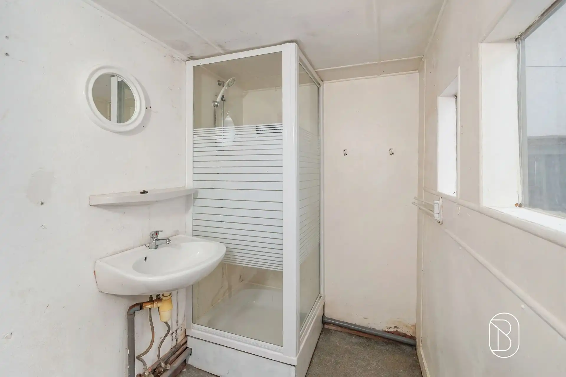 Te renoveren woning in centrum Lessines. foto 8