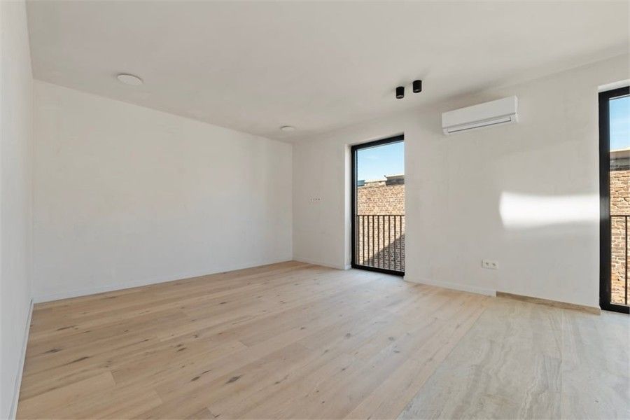 3 SLK APPARTEMENT MET RUIME TUIN EN PARKEERPLAATS IN HET CENTRUM VAN LANDEN - mogelijk aankoop 6% BTW foto 24