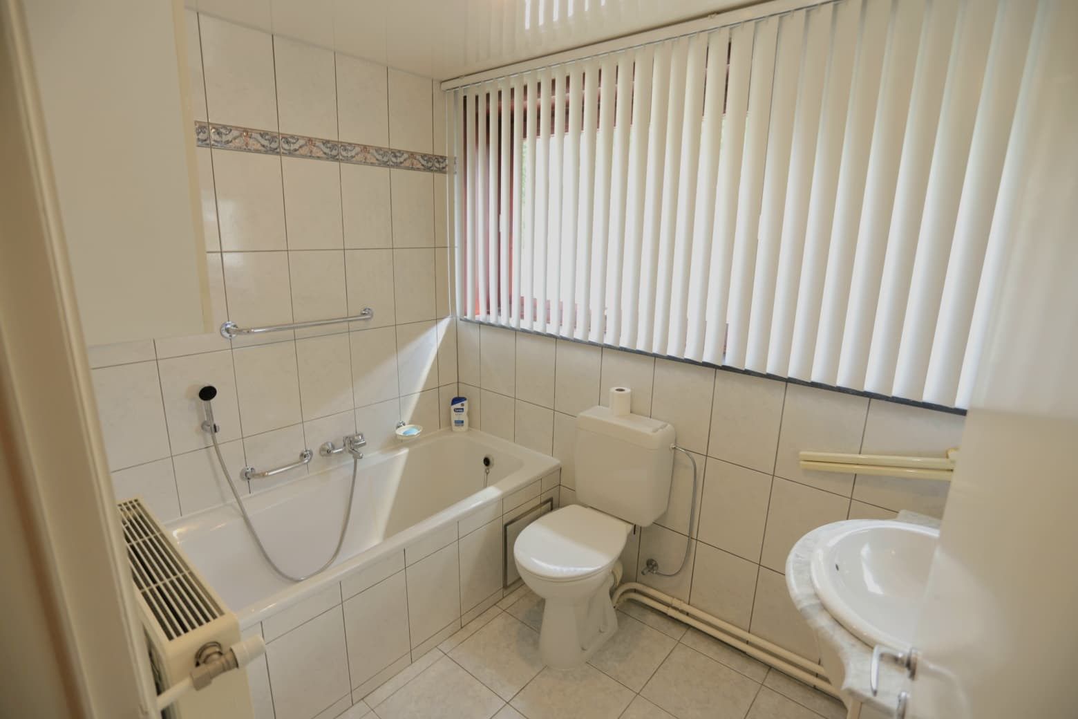 Halfopen gezinswoning met potentieel te Bosblook Genk foto 12